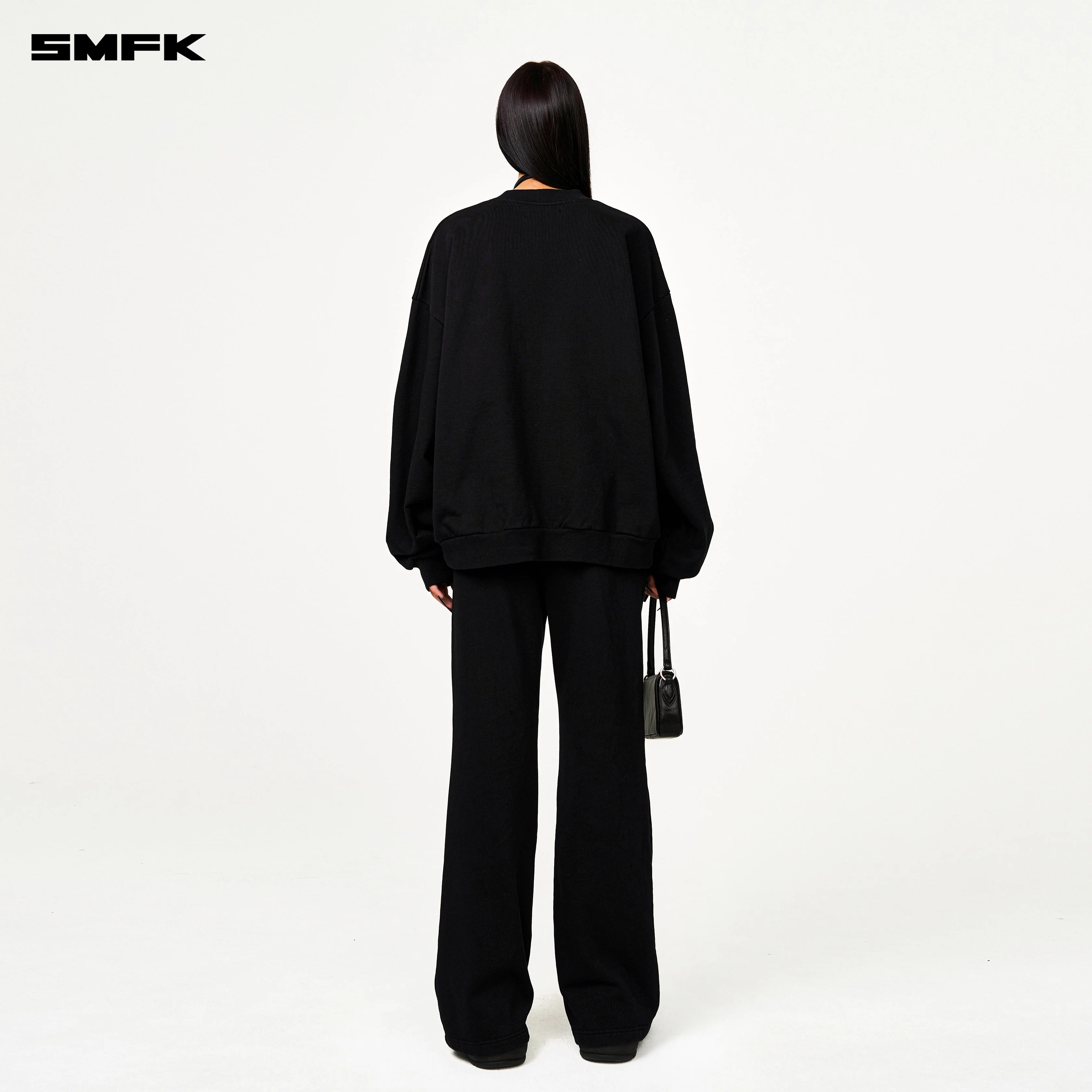 Compass Cross Classic Flared Track Pants in Black - Image 4