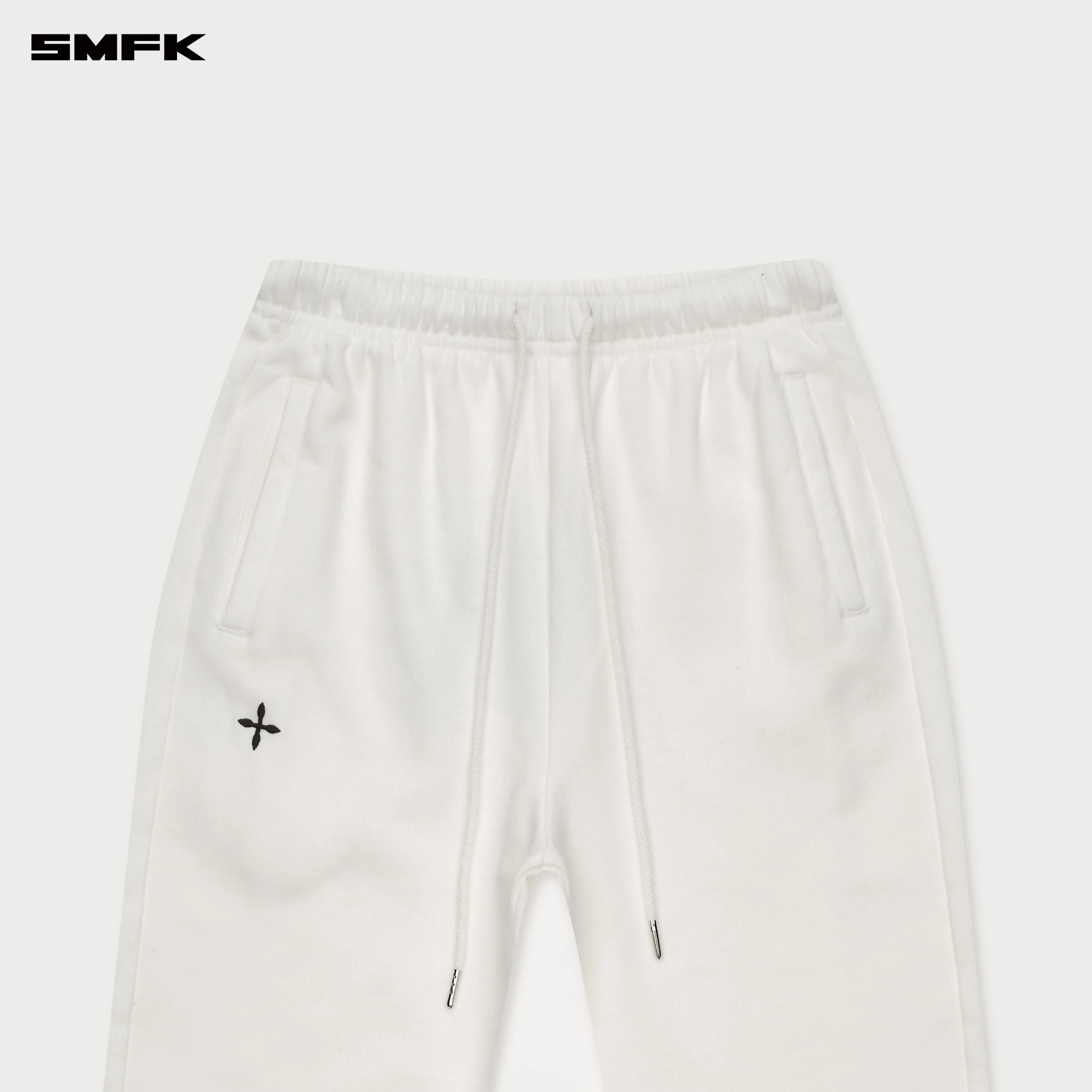 Compass Cross Classic Flared Track Pants in White - Image 8